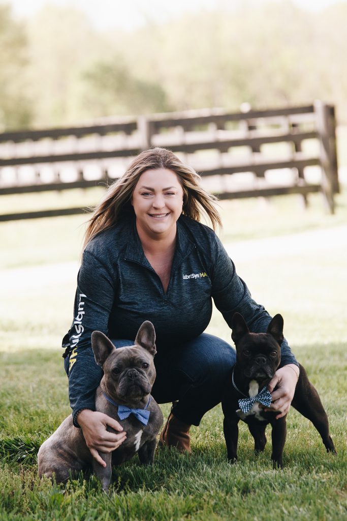 Staff photo of Kelly Allday and her dogs, Charlie and Bodhi
