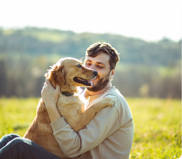 Man outside with dog