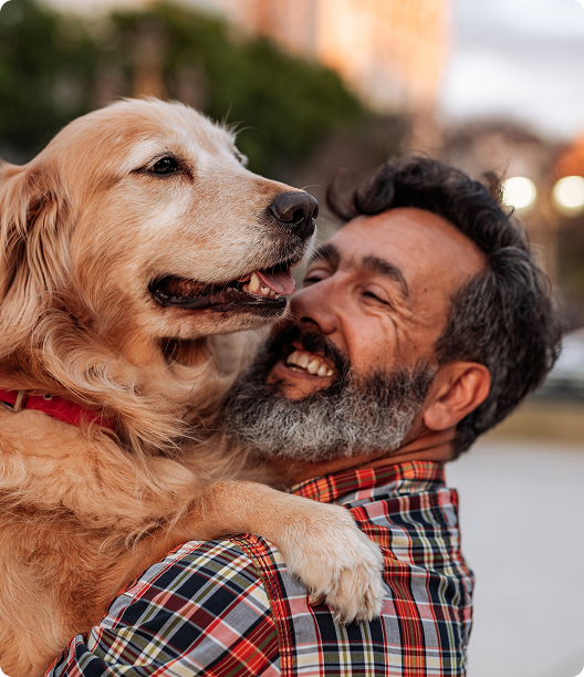 man holding dog
